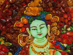 Panel with amber in combination with lurex and Swarovski stones “Green Tara”