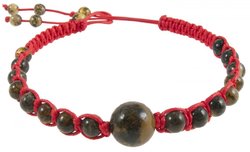 Amulet beads with a red thread and greenish amber balls
