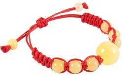 Amulet bracelet with red thread and light amber balls