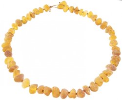 Stone beads made of light polished amber through a knot (medicinal)