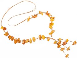 Braided beads made of polished amber stones of honey color