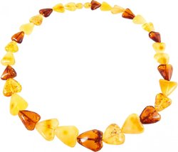 Beads made of amber stones in the shape of a heart