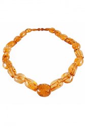 Beads made of figured amber stones