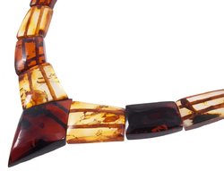Beads made of figured amber stones (with a dark diamond-shaped center)