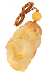 Carved amber pendant “Dragon”