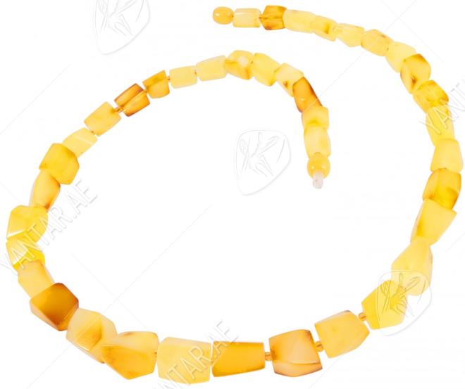 Figured amber beads
