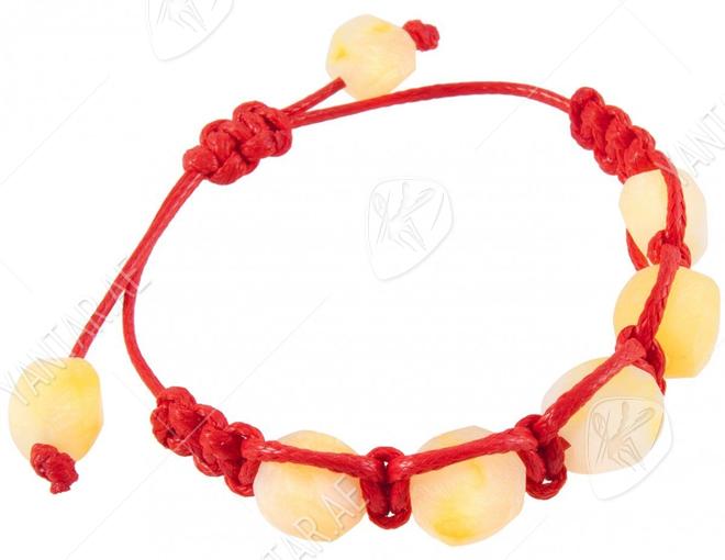 Amulet bracelet with red thread and light polished amber
