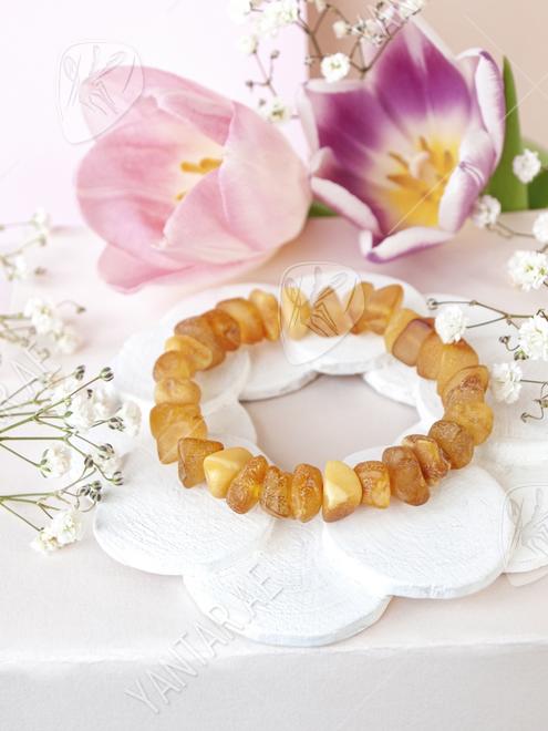 Healing bracelet made of polished amber stones Healing bracelet made of polished amber stones