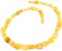 Figured amber beads