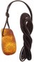 Healing pendant made of polished amber on a waxed thread
