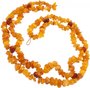 Openwork beads made of amber stones