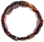 Amber bracelet made of polished oval plates in cognac shade