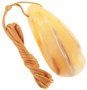Pendant made of polished amber (medicinal) with relief carvings