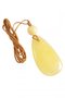 Pendant with polished stone and amber ball