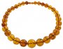 Beads-balls made of light amber