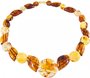Bead necklace made of multi-colored amber