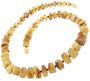 Polished amber beads