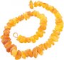 Amber beads made of polished stones