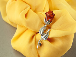 Silver brooch with amber “Amber Rose”