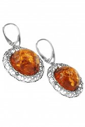 Earrings with amber cabochons in an openwork silver frame “Samantha”