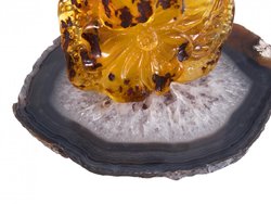 Amber souvenir on an agate stand “Flowers”