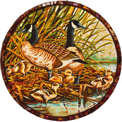 "Wild ducks with ducklings"