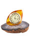 Amber clock on an agate stand